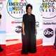 Illustration for article titled Statement Suits, Plush Pinks, and a Lotta Gowns on the American Music Awards Red Carpet
